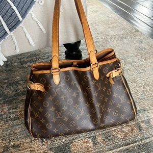 Authentic Louis Vuitton. GREAT condition!  Straps have natural worn leather look